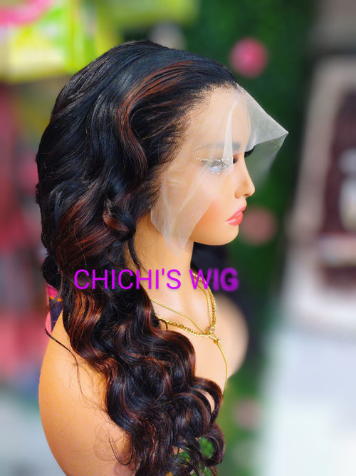 Mannequin head with wavy black hair styled in a ponytail, branded 'CHICHI'S WIG'.